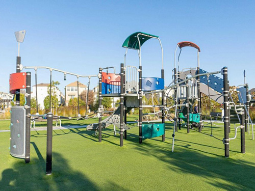 Children's play structure at Bayshores Master and Cove & Strand at Bayshores Associations.