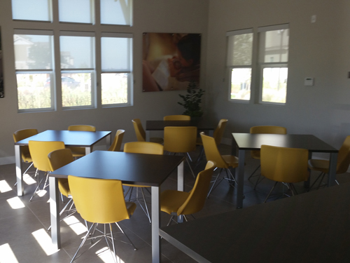 Indoor seating area at Bayshores Master and Cove & Strand at Bayshores Associations.